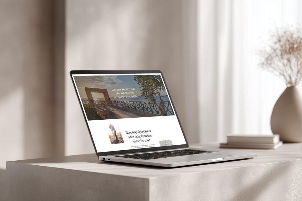A laptop with a travel advisor website pulled up on the screen.