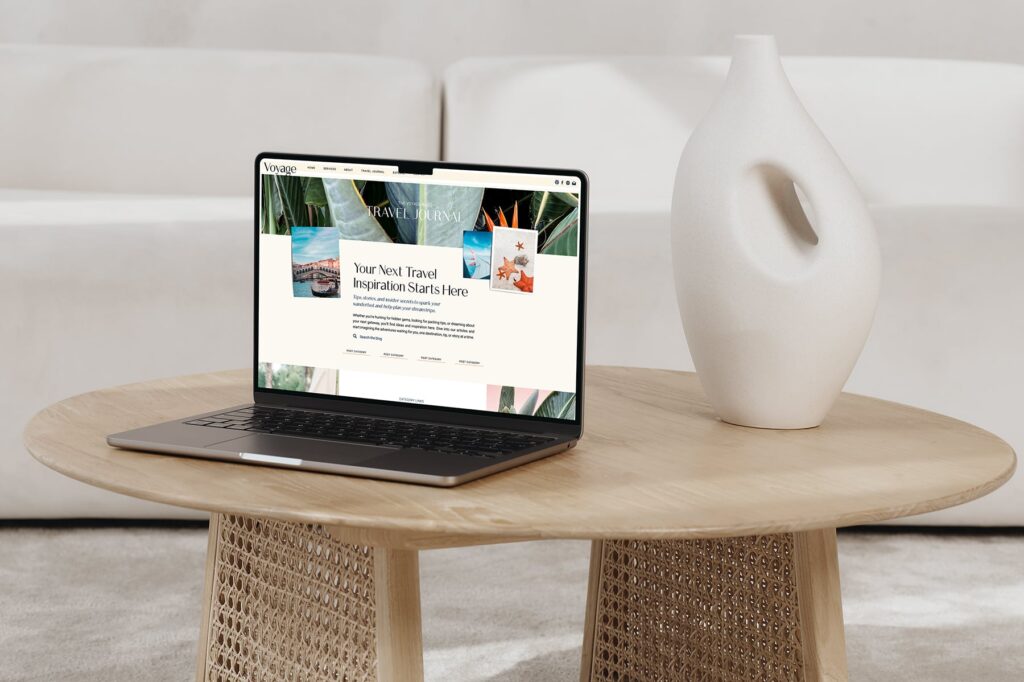 travel agency template shown on a laptop screen on a wood table